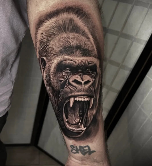 Big Black and Grey Gorilla Tattoo on Men Arm by @chrissyleetattoo