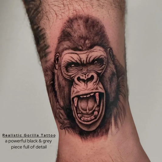 Big Black and Grey Gorilla Tattoo on Men Arm by @giti.tattoos