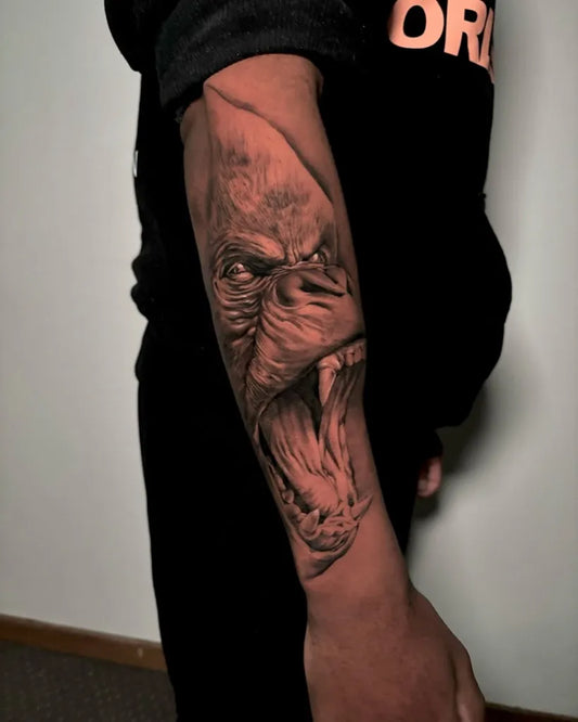 Big Black and Grey Gorilla Tattoo on Men Arm by @hillsidetattoostudio