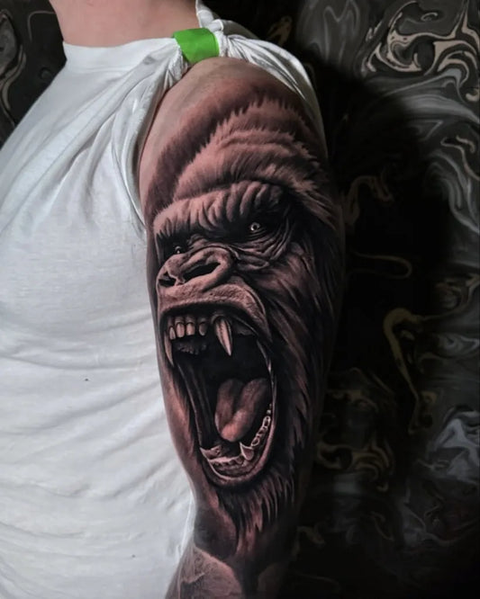 Big Black and Grey Gorilla Tattoo on Men Arm by @ovidiu_p_tattoo
