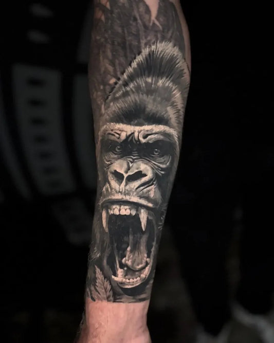 Big Black and Grey Gorilla Tattoo on Men Arm by @soleya.ink