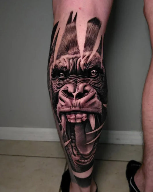 Big Black and Grey Gorilla Tattoo on Men Leg by @jmds_ink