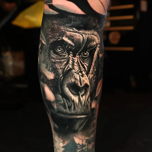 Big Black and Grey Gorilla Tattoo on Men Leg by @killerinktattoo