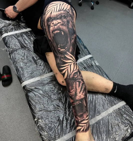 Big Black and Grey Gorilla Tattoo on Men Thigh by @astartattoos