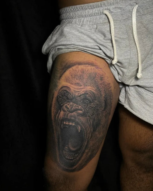 Big Black and Grey Gorilla Tattoo on Men Thigh by @de_adittattoo