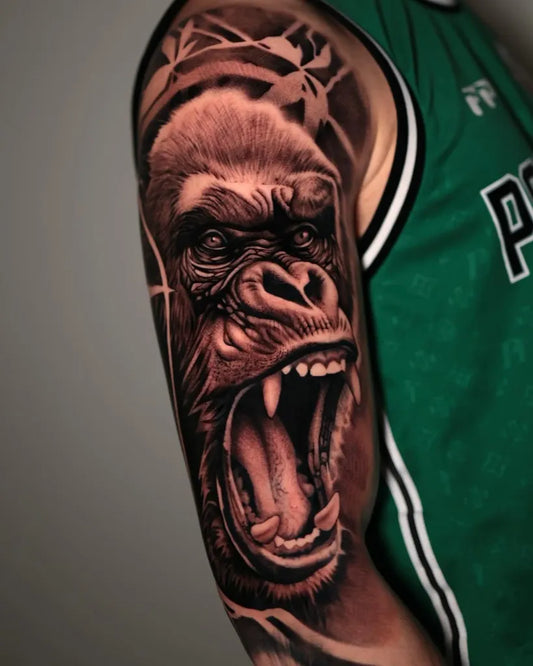 Big Black and Grey Gorilla Tattoo on Men Upper Arm by @haissammokdad