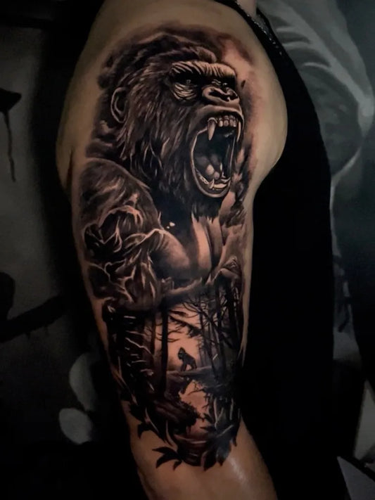 Big Black and Grey Gorilla with Roses and Jungle Tattoo on Men Arm by @paantelicaleksa