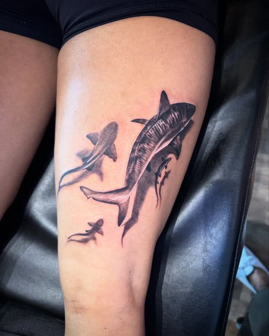 Big Black and Grey Great White Sharks and Baby Sharks on Women Thigh Tattoo by @carlostolentino13