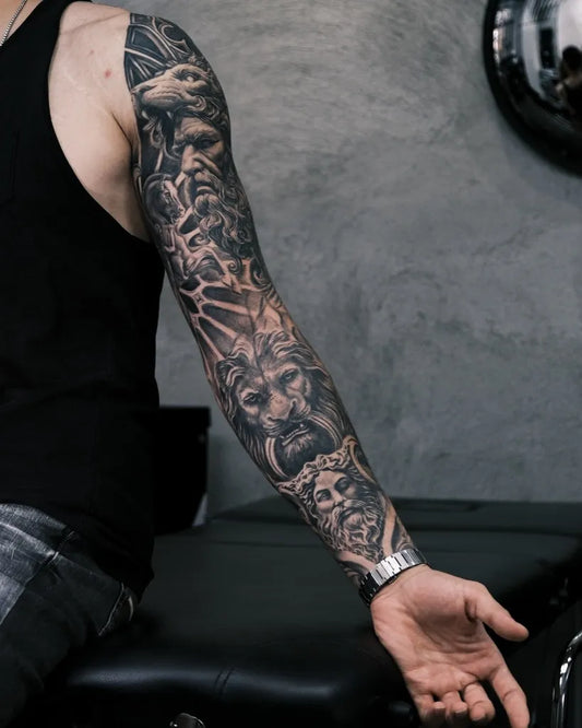 Big Black and Grey Greek God and Wolf Tattoo on Men Upper Arm by @canaslan.ink