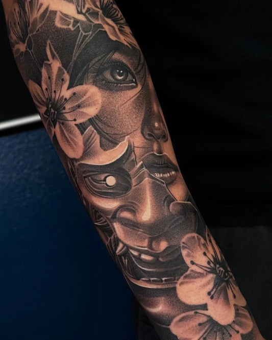 Big Black and Grey Hannya Mask and Cherry Blossoms Tattoo on Women Arm by @jgarcestattoo