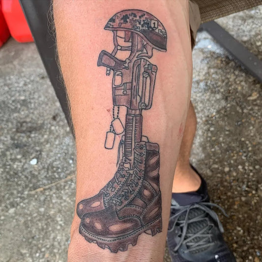 Big Black and Grey Helmet Rifle Boots Military Tattoo on Men Arm by @wrightwaytattoo12