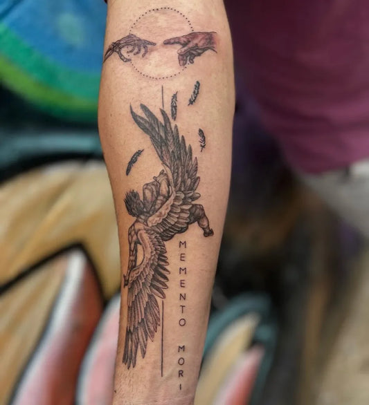 Big Black and Grey Icarus Angel with Falling Feathers and Memento Mori on Men Arm Tattoo by @indiabehrens