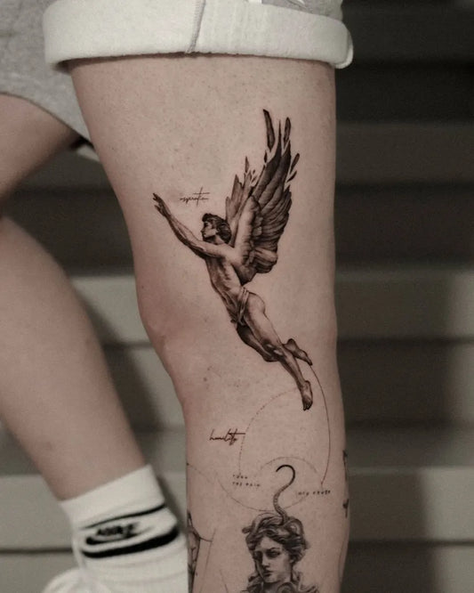Big Black and Grey Icarus with Angel and Serpent on Women Thigh Tattoo by @valentina.tattoos