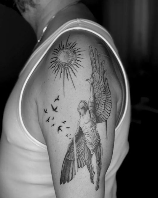 Big Black and Grey Icarus with Sun and Birds on Men Arm Tattoo by @thomazmalta
