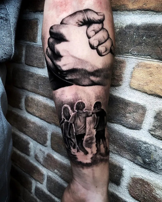 Big Black and Grey Interlinked Hands and Children Family Tattoo on Men Arm by @s.g.tattoo