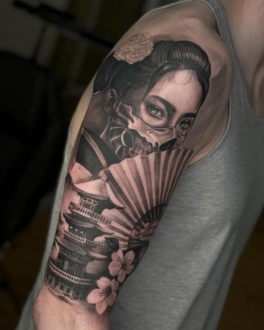 Big Black and Grey Japanese Woman with Mask and Pagoda Tattoo on Men Upper Arm by @skincitytattoodublin