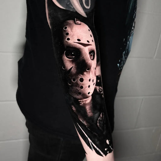 Big Black and Grey Jason Voorhees Mask Horror Tattoo on Men Arm by @medxtattoo