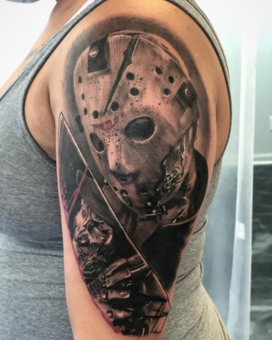 Big Black and Grey Jason Voorhees Mask and Machete Horror Tattoo on Women Arm by @jefftattoos12