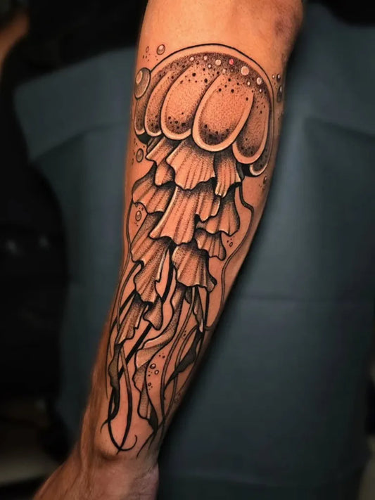 Big Black and Grey Jellyfish Tattoo on Men Arm by @kelcie.spector