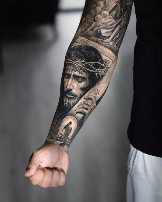Big Black and Grey Jesus Angels and Cross Tattoo on Men Arm by @iulian_skulls_n_roses_tattoo