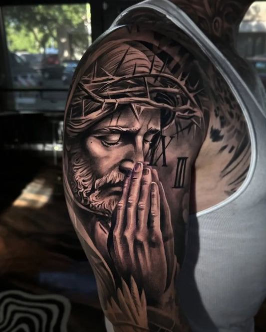 Big Black and Grey Jesus Praying with Crown of Thorns Tattoo on Men Arm by @sue_monsta