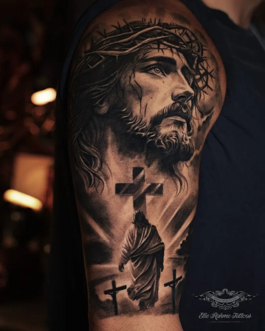 Big Black and Grey Jesus and 3 Cross Tattoo on Men Arm by @elierahmetattoos