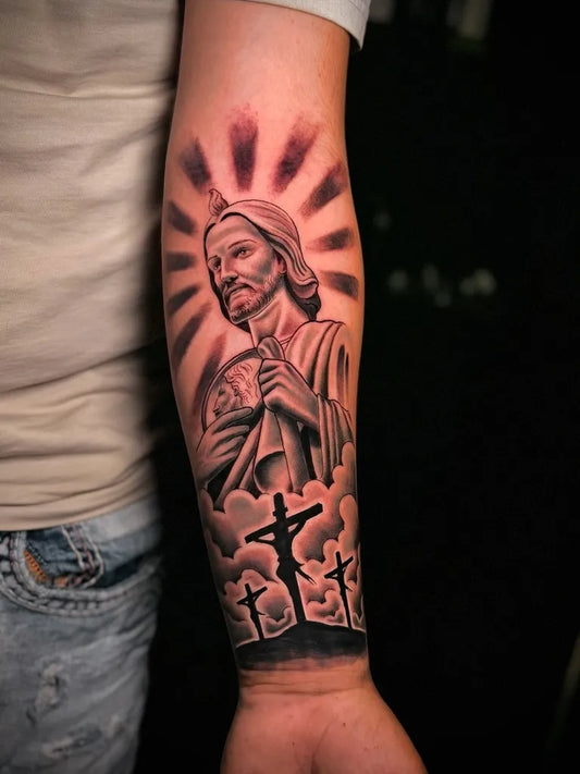 Big Black and Grey Jesus with 3 Cross Tattoo on Men Arm by @screwhead_inkz