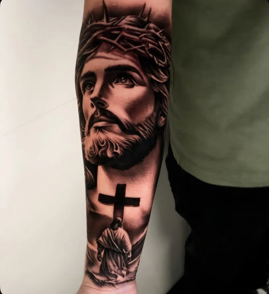 Big Black and Grey Jesus with Cross and Crown of Thorns Tattoo on Men Arm by @bigrichtattoos