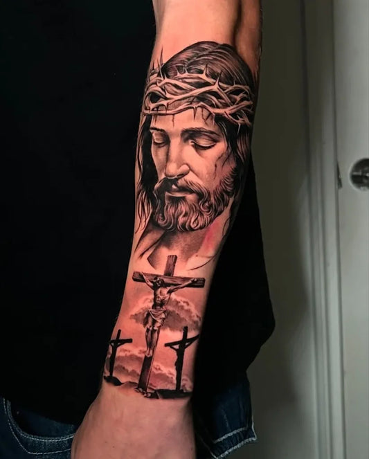 Big Black and Grey Jesus with Crosses Tattoo on Men Arm by @luna.inkk