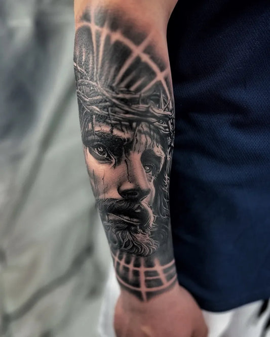 Big Black and Grey Jesus with Crown of Thorns Tattoo on Men Arm by @moshumoku