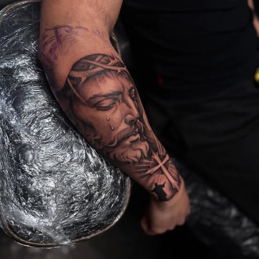 Big Black and Grey Jesus with Crown of Thorns and Cross Tattoo on Men Arm by @7even_ink