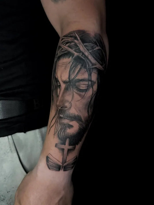 Big Black and Grey Jesus with Crown of Thorns and Cross Tattoo on Men Arm by @christinis_inkaholic