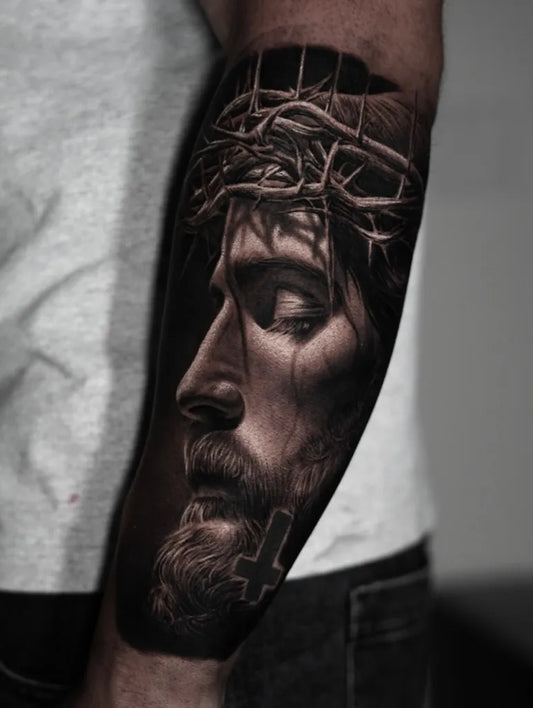 Big Black and Grey Jesus with Crown of Thorns and Cross Tattoo on Men Arm by @gbaby_inks
