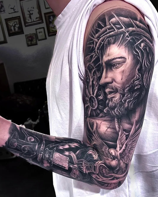 Big Black and Grey Jesus with Crown of Thorns and Dove Tattoo on Men Arm by @ryuo_tattoo