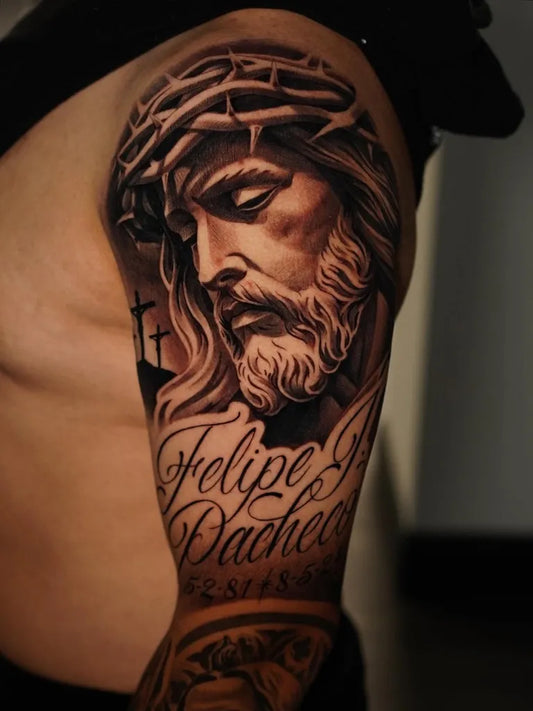 Big Black and Grey Jesus with Crown of Thorns and Name Script Tattoo on Men Arm by @jessem_tattoos