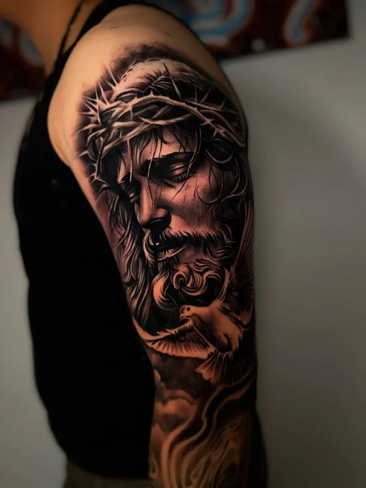 Big Black and Grey Jesus with Dove Tattoo on Men Arm by @genofiftysix