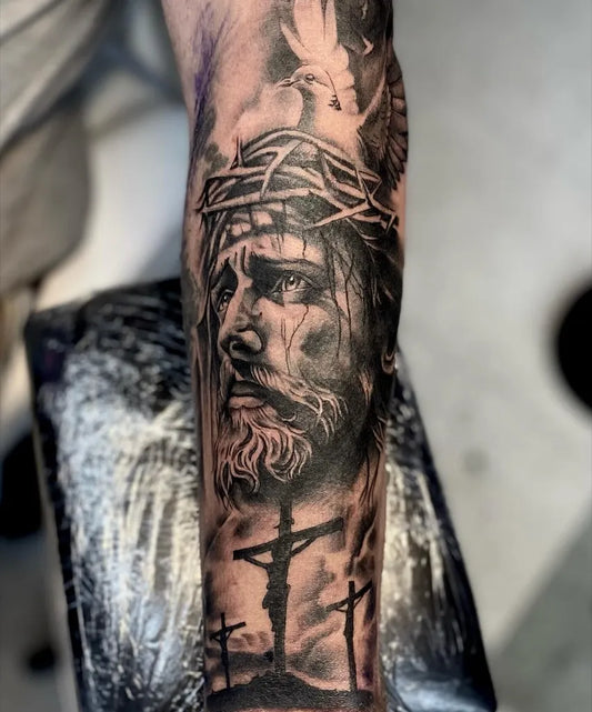 Big Black and Grey Jesus with Dove and Crosses Tattoo on Men Arm by @ky_tattoosx3