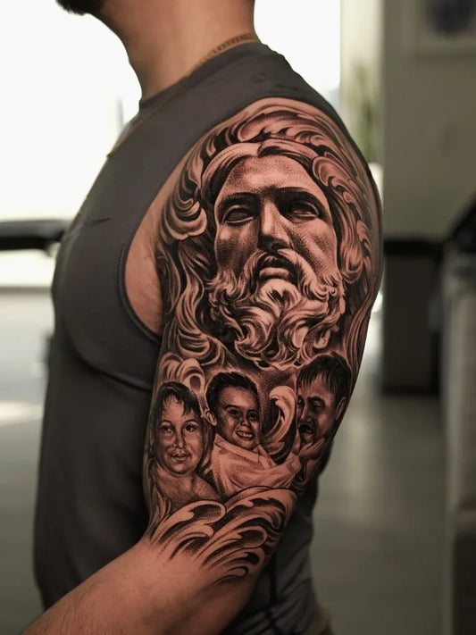 Big Black and Grey Jesus with Family Tattoo on Men Arm by @aarontorrestattoo