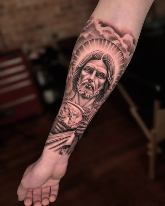 Big Black and Grey Jesus with Sacred Heart and Clouds Tattoo on Men Arm by @alexey.ink_