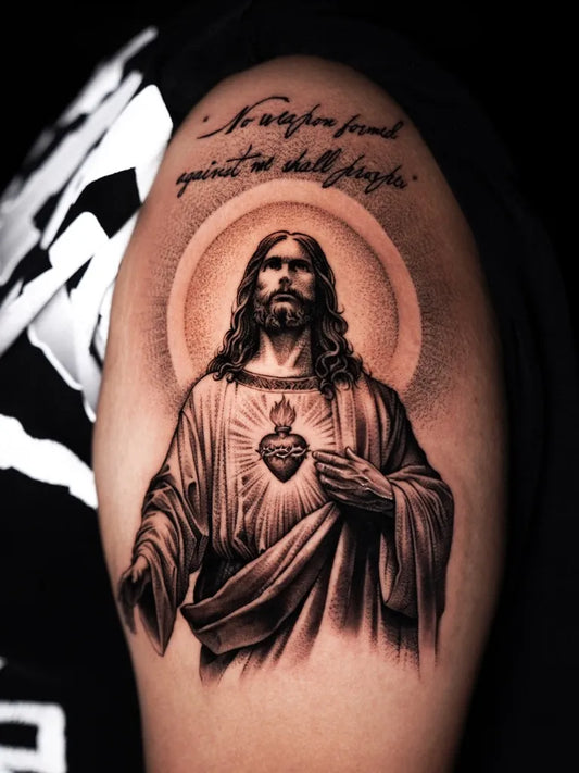 Big Black and Grey Jesus with Sacred Heart and Latin Text Tattoo on Men Shoulder by @jedattboy
