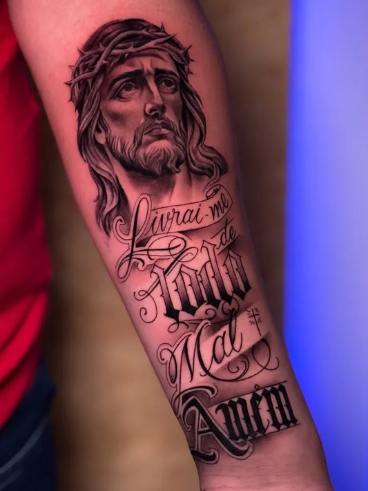 Big Black and Grey Jesus with Script Tattoo on Men Arm by @bandi_tatuador