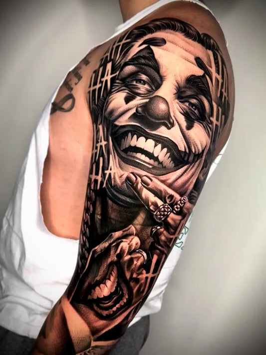 Big Black and Grey Joker Clown Face on Men Arm Tattoo by @tatts_by_t