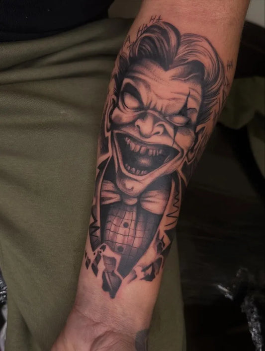 Big Black and Grey Joker Men Arm Tattoo by @inkita_roolia