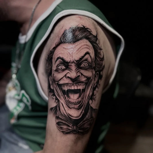 Big Black and Grey Joker Portrait on Men Arm Tattoo by @andy_hoodz