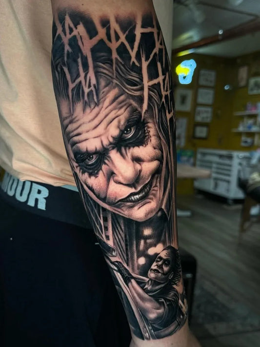 Big Black and Grey Joker Portrait on Men Arm Tattoo by @mattstone_tattoos