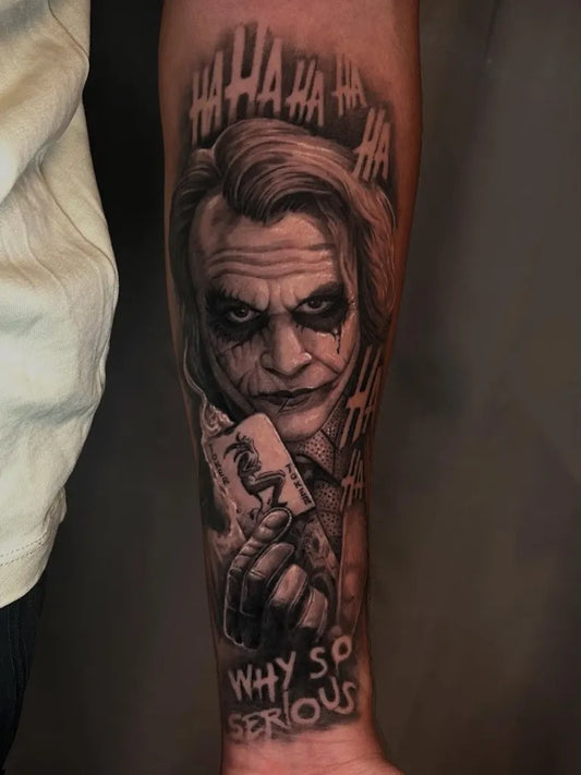 Big Black and Grey Joker Portrait on Men Arm Tattoo by @miguel_bume