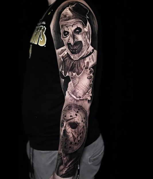 Big Black and Grey Joker and Jason Horror Tattoo on Men Arm by @ammanyexchange