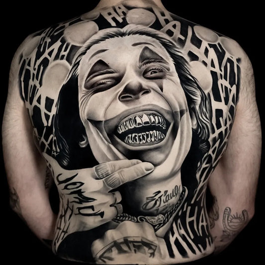 Big Black and Grey Joker laughing on Men Back Tattoo by @inksuppe