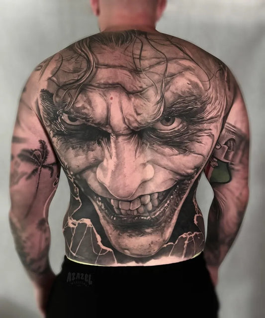 Big Black and Grey Joker on Men Back Tattoo by @azazelwarszawa