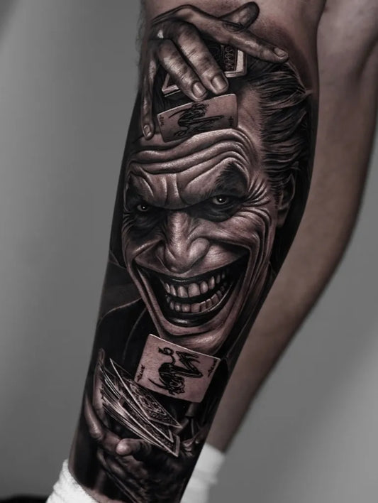 Big Black and Grey Joker with Cards on Men Leg Tattoo by @gbaby_inks